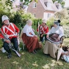 Members chatting at the Victorian weekend Raglan Castle 2023.jpg